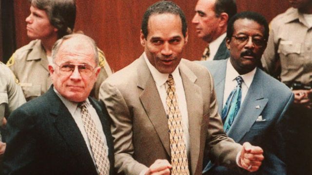 O.J. with lawyers during his trial