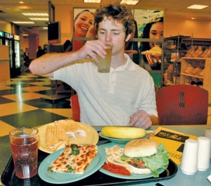 Student eating at cafeteria