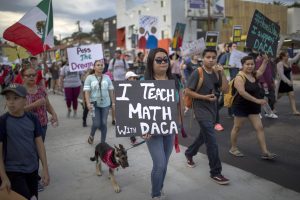 A "Defend DACA" march in California strives to demonstrate how fundamental immigrants are to America (Image via Capital and Main)
