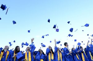 Students celebrating college graduation