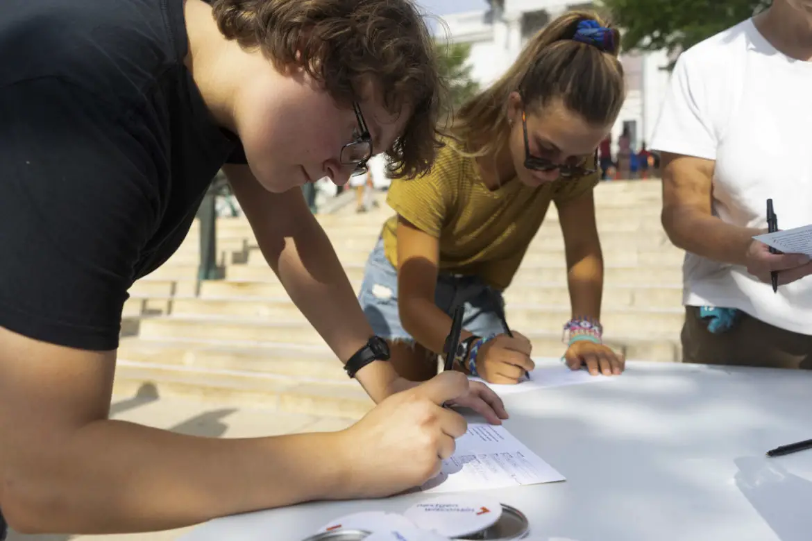 Letting students know you're available and eager to answer voting questions is more helpful than you think. (Image via Wisconsin Public Radio)