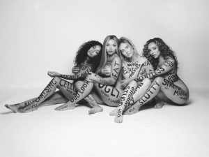 Little Mix's video for "Strip" goes against the song's empowering lyrics. (Image via Evening Standard)