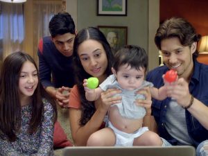 Picture of "Party of Five" family on video chat with parents