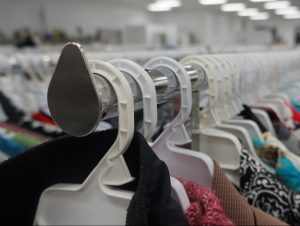 Clothes at a thrift store that be used for DIY projects