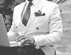 Man wearing dapper suit in black and white