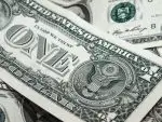 Photo of dollar bills in article about money