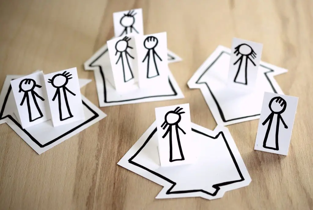 stick figures stuck in houses in article about quarantine