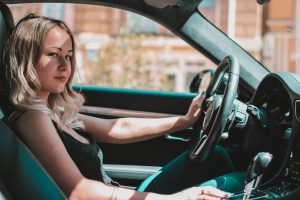 Photo of woman driving in a car