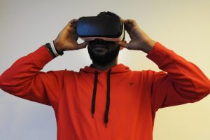 Man with virtual headset ready to do some online gaming