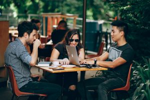 Image of 3 millennials at lunch