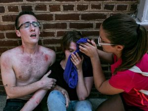 three people, one injured, after the vehicle attack at the Unite the Right rally in the American South