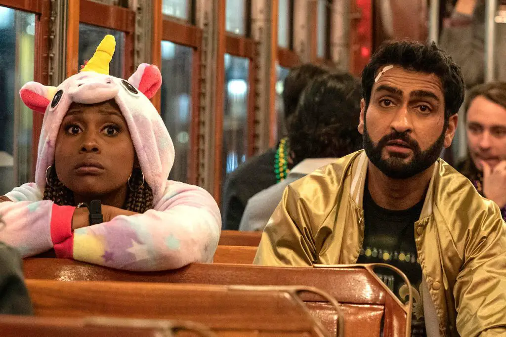 Issa Rae and Kumail Nanjiani ride the bus in crazy disguises in 'The Lovebirds'