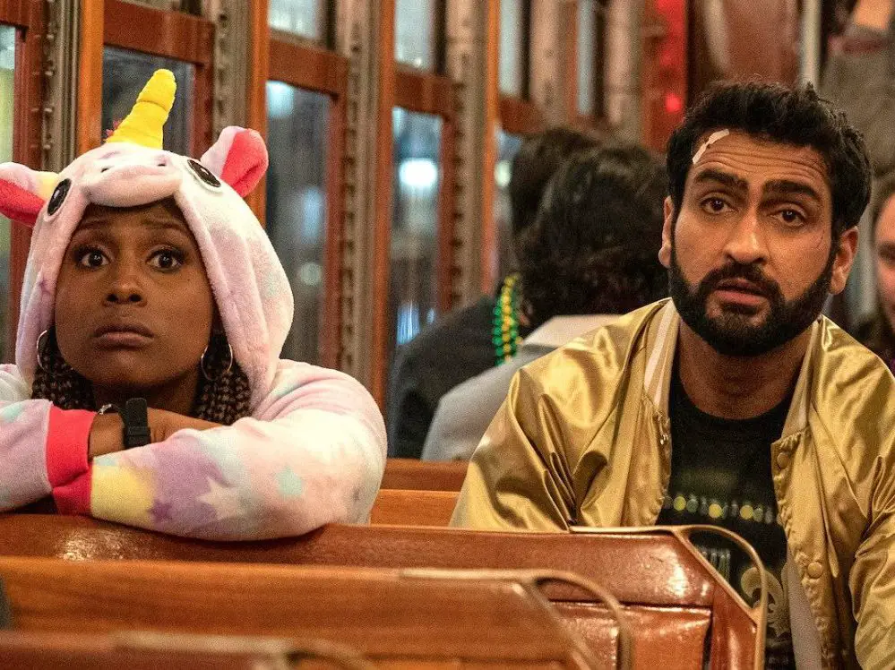 Issa Rae and Kumail Nanjiani ride the bus in crazy disguises in 'The Lovebirds'