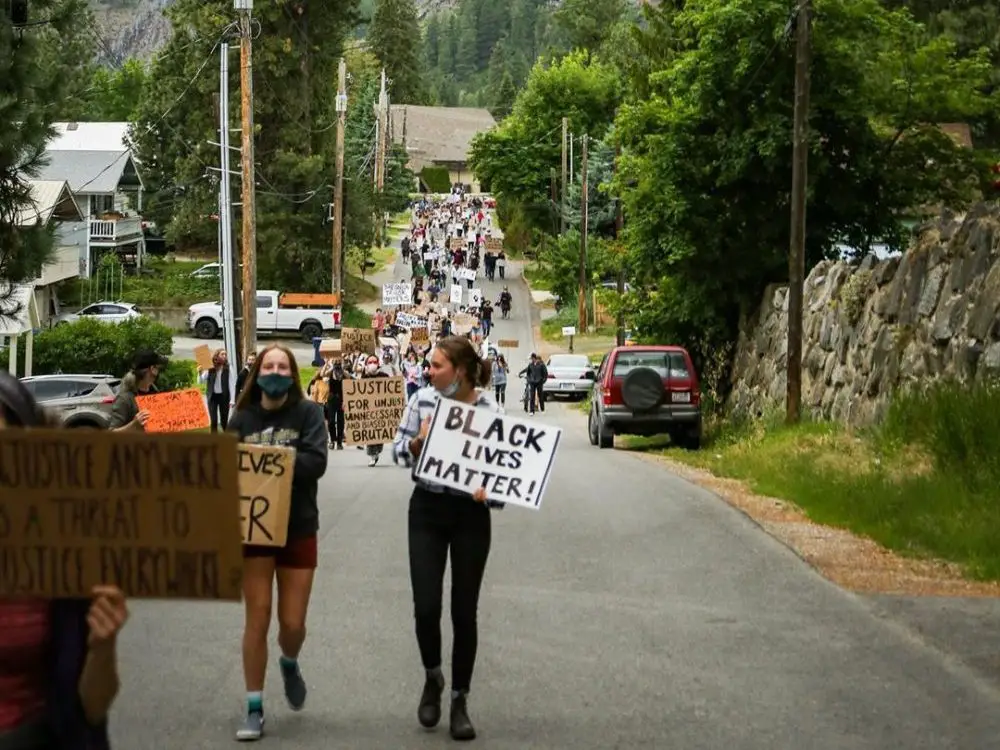 Black Lives Matter demonstration photo in an article on educating parents about active allyship