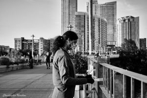 Photo by Christopher Winston of a woman at a COVID-19 memorial