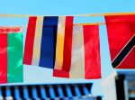 Photo of flags from Unsplash in article about ICE wanting to deport international students