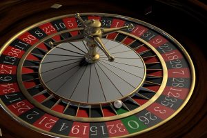 in article about online casino games, a roulette wheel