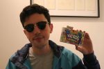 Mike from Mike's Mic holding a box of nerds