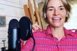 Leisha Hailey talking into a microphone on the "Pants" podcast
