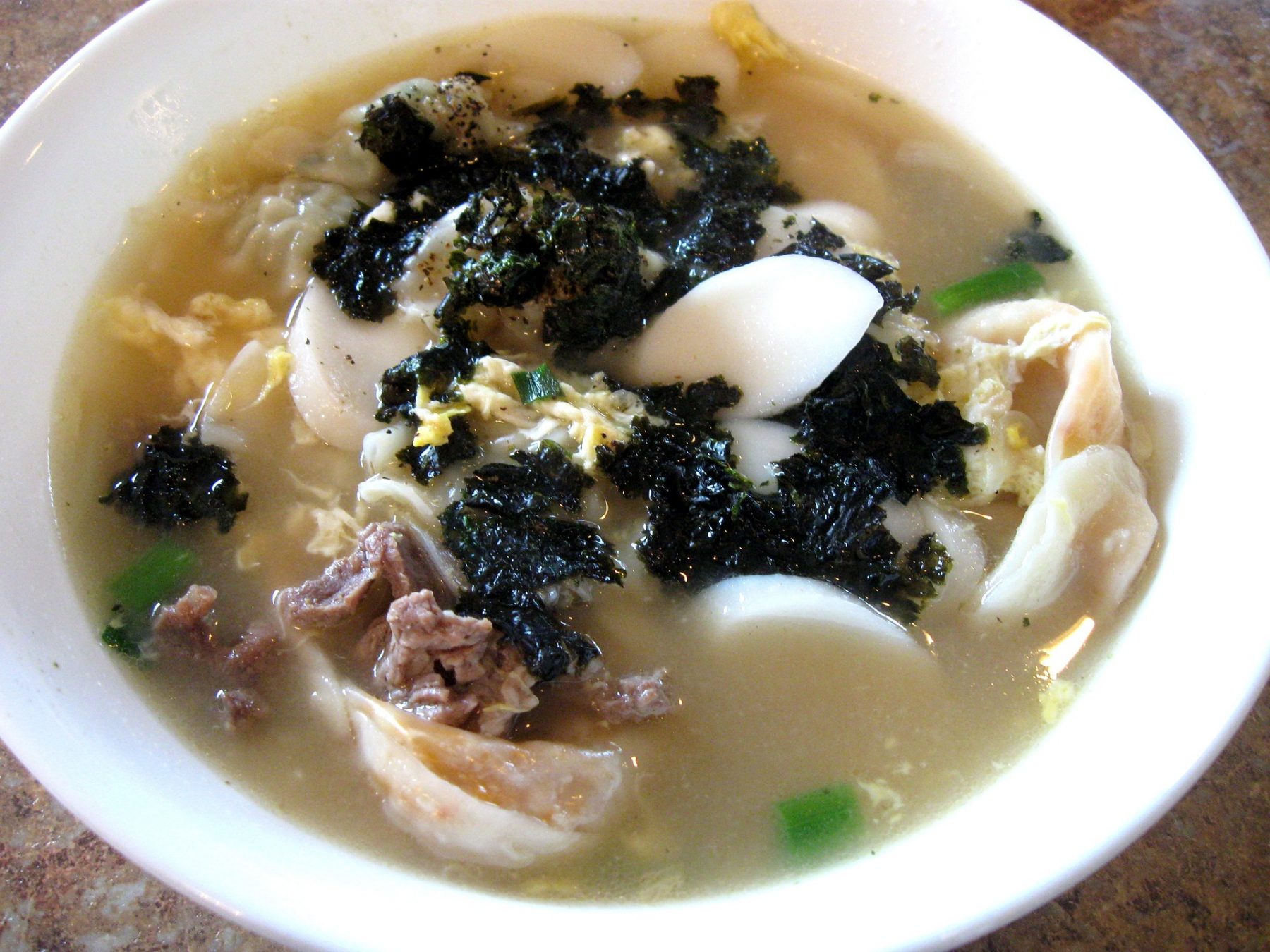 Image of ddukguk, a food eaten at a typical Korean New Year's celebration