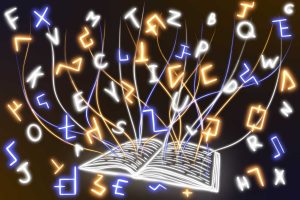 in an article about conlanging, an illustration of an open book with letters surrounding it on all sides