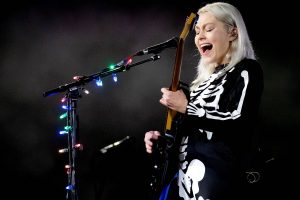 An image of Phoebe Bridgers performing