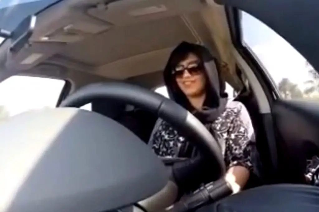 Loujain al-Hathloul filming a video of herself driving