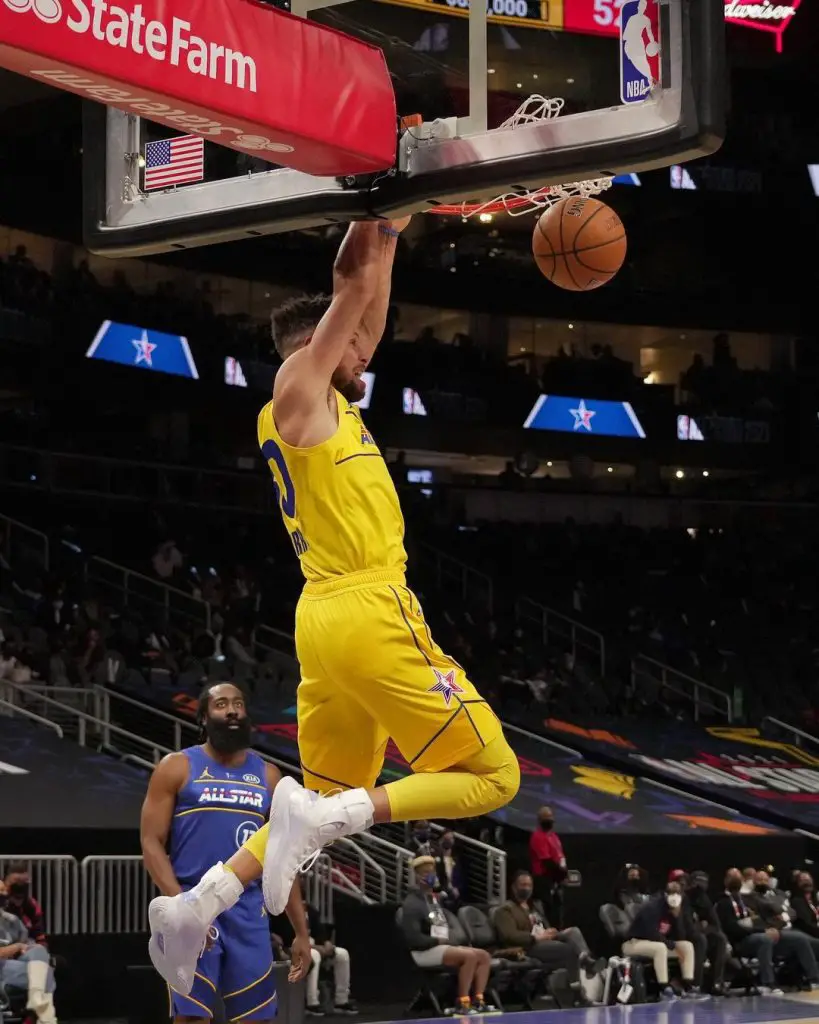 Steph Curry dunking in an article about NBA All-Star Weekend