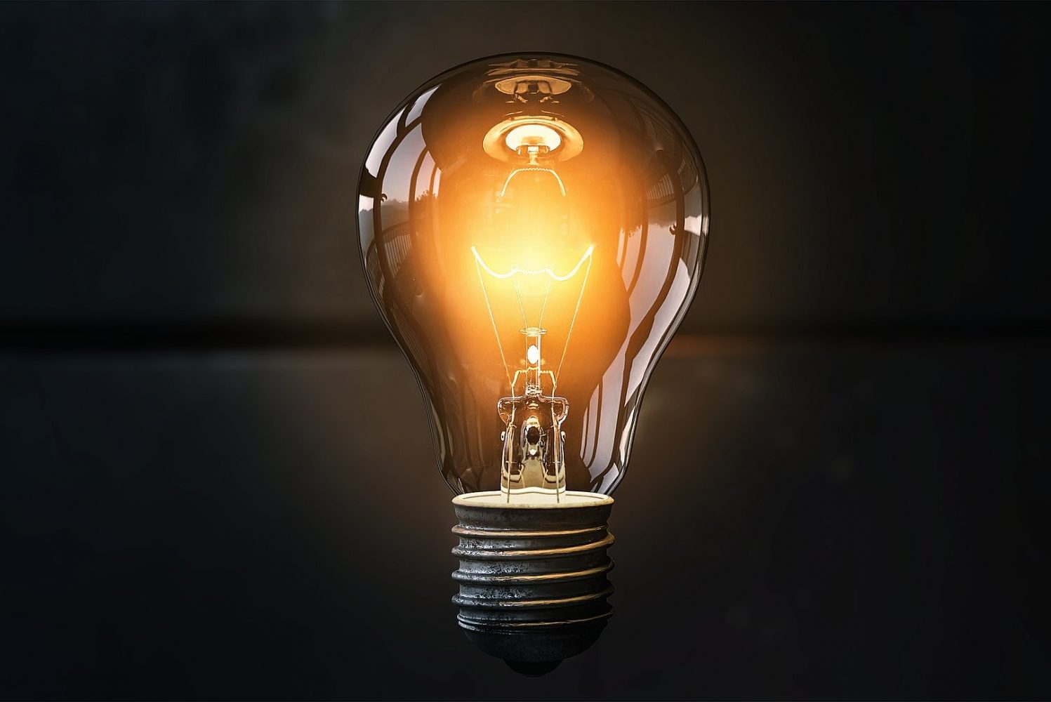 in an article about marketing an invention, a photo of a lit lightbulb