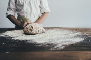 An image of a baker in a tasteful white uniform demonstrates the working-class aesthetic.