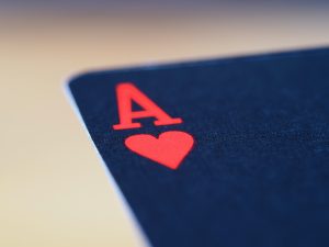 in article about online casinos, an ace of hearts playing card