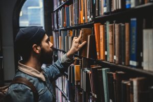 in an article about getting a master's degree, a person in a library