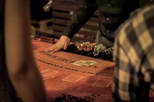 cards on a casino table in an article about betting sites