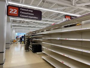 In an article about food inequality, empty grocery store shelves