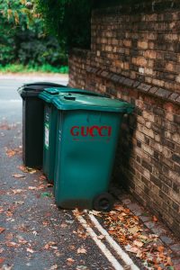 Green Gucci branded Garbage Can
