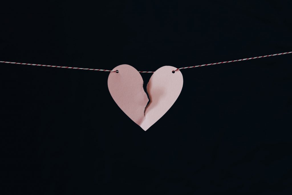 broken paper heart in an article about cheating