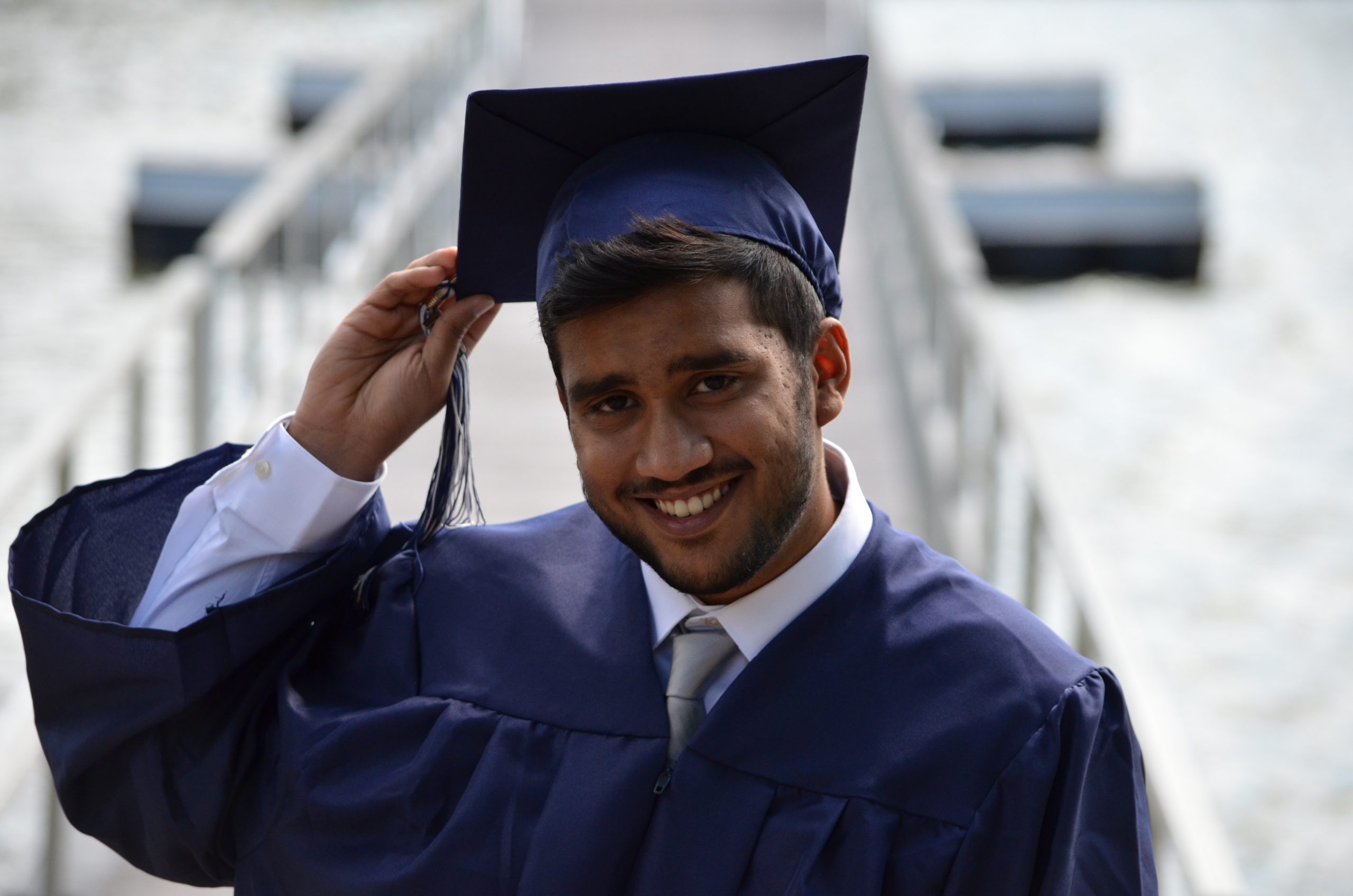 in an article about tuition-free college, a photo of someone graduating