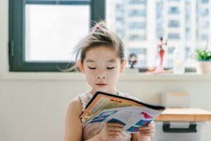 child reading a book