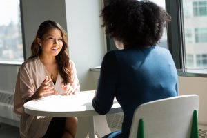 Two women at a job interview.