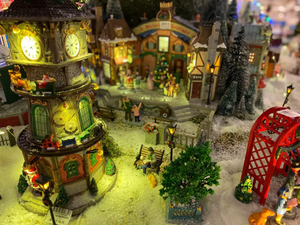 Christmas village with a clock tower and buildings