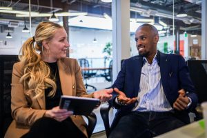 two young entrepreneurs in conversation