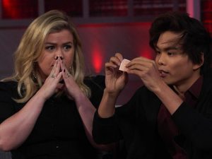 Shin Lim on America's Got Talent next to Kelly Clarkson