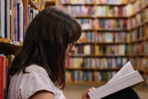 a person studying in a library