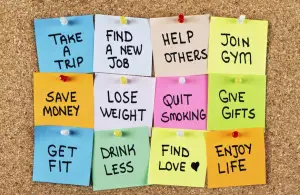 12 sticky notes with different ideas for resolutions.