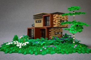 lego architecture set with grass and modern building