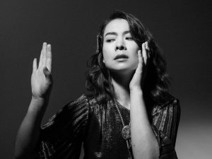 in article about Laurel Hell, a photograph of Mitski