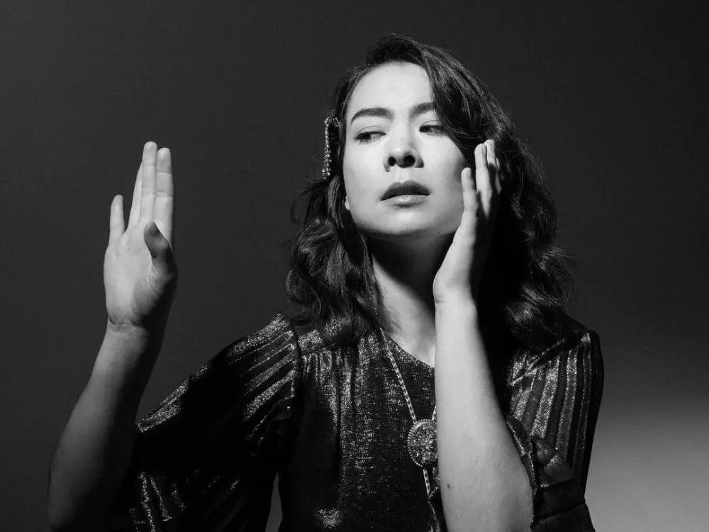 in article about Laurel Hell, a photograph of Mitski