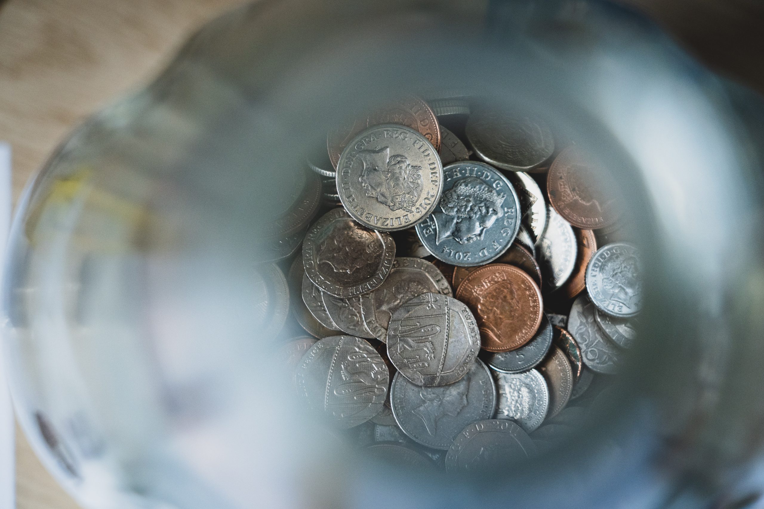 in article about financial tips for college students, a jar of coins