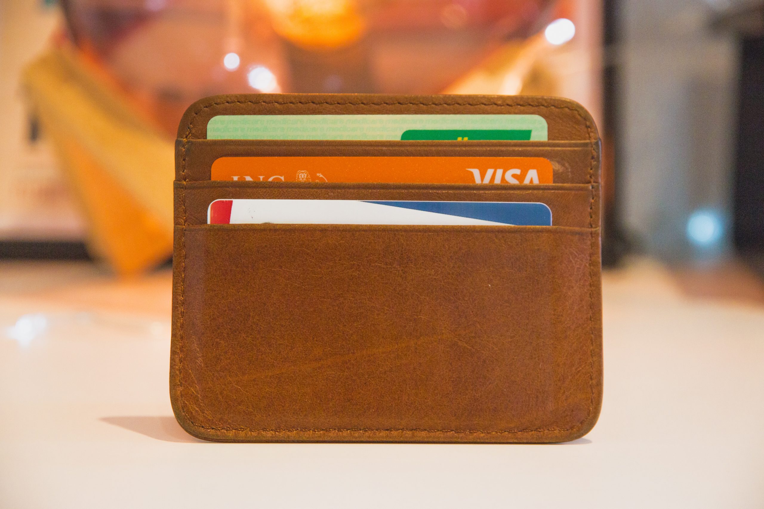 in an article about sports betting and payment options, a wallet with credit cards in it