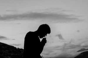in article about mental health and substance abuse, a silhouette of a person smoking